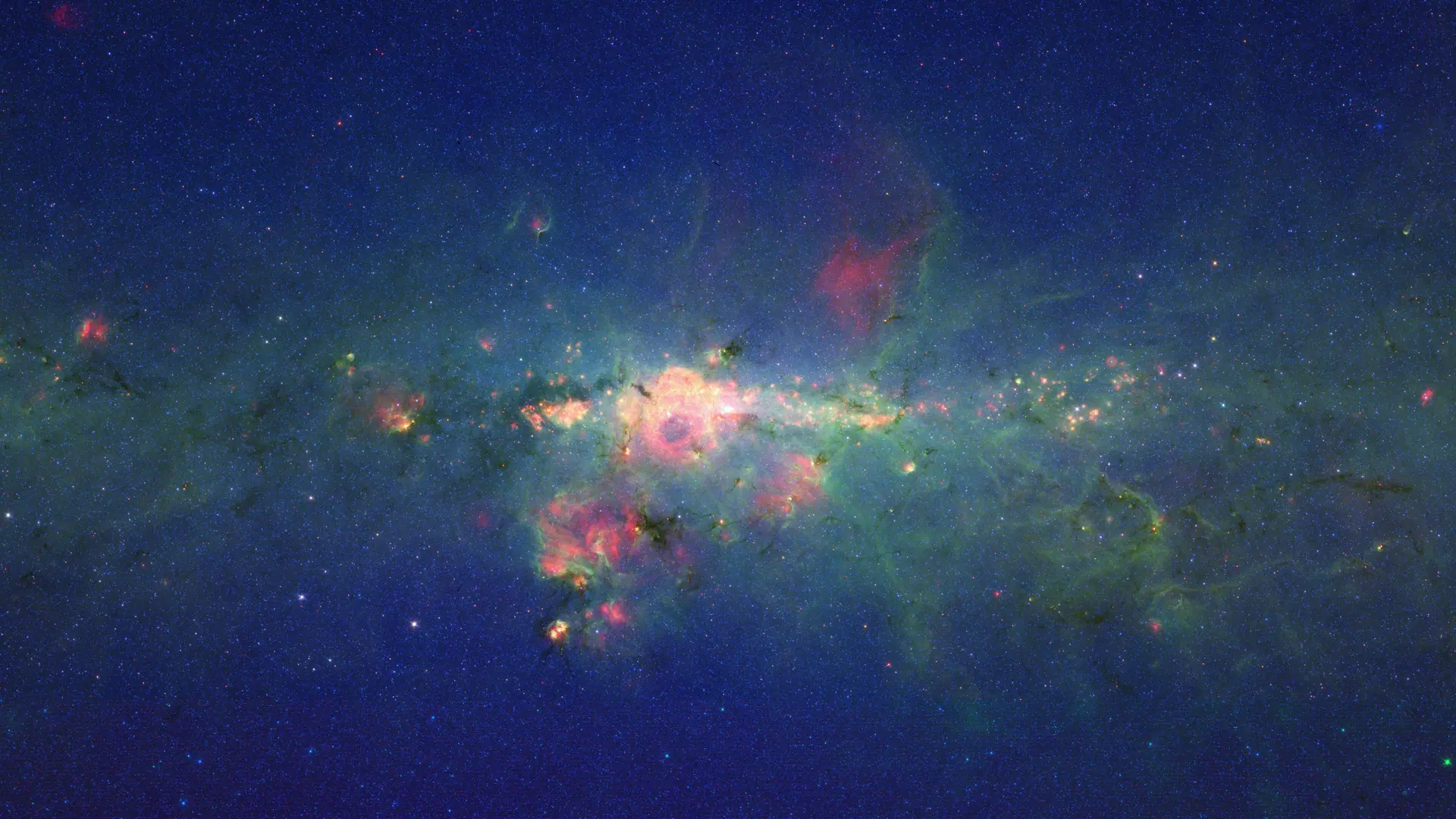 Stars Gather in Downtown Milky Way. Credit: NASA/JPL-Caltech. NASA media guidelines (public domain). Infrared view of the dense star field at the centre of the Milky Way, home of the central black hole